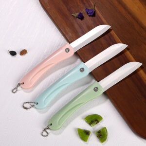 Portable folding ceramic fruit knife with chain